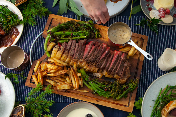 UK ex-dairy sirloin steak served with tenderstem, beef dripping chip and pre-made peppercorn sauce
