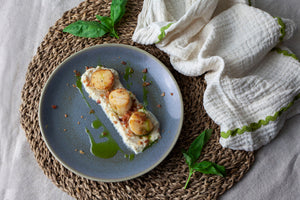 Scallops with artichoke puree, bacon crumb and basil oil