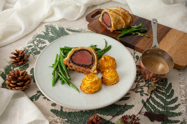 Venison wellington served with green beans, Pomme Ducheese and Marsala sauce