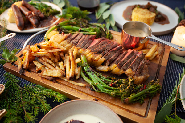 UK ex-dairy sirloin steak served with tenderstem, beef dripping chip and pre-made peppercorn sauce