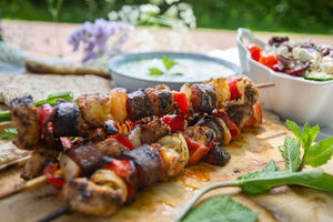 Monkfish and chorizo kebabs with Greek salad, tzatziki and flatbreads