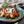 Load image into Gallery viewer, Tandoori Chicken Lollipops served with a cucumber and mint dipping sauce
